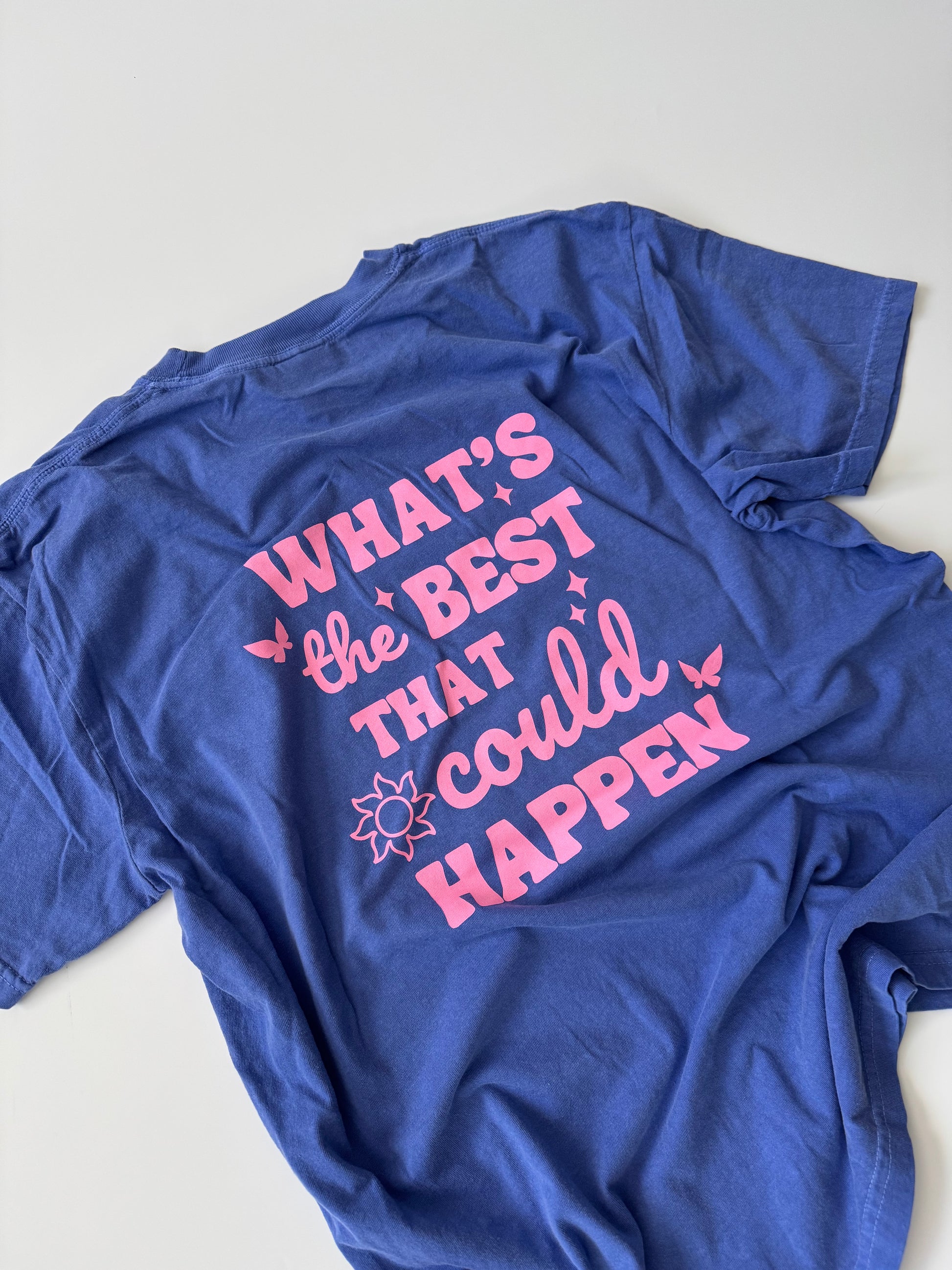 Heathered blue graphic t-shirt with “All Good Days” front design and “What’s the Best That Could Happen” back print, unisex fit